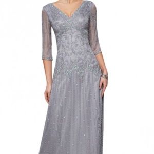 Light silver beaded gown from NC Gowns. Perfect size 18w